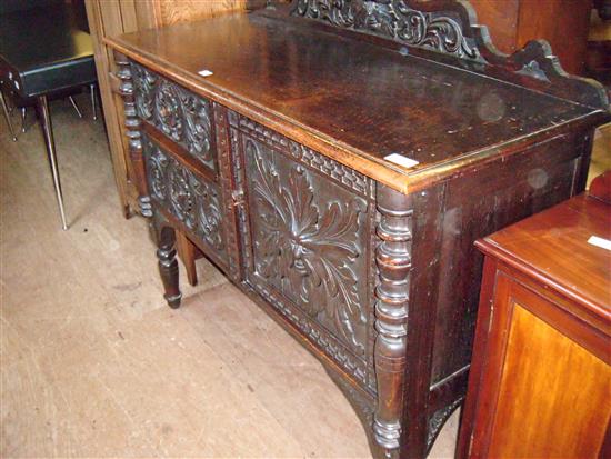 Dark carved  oak sideboard